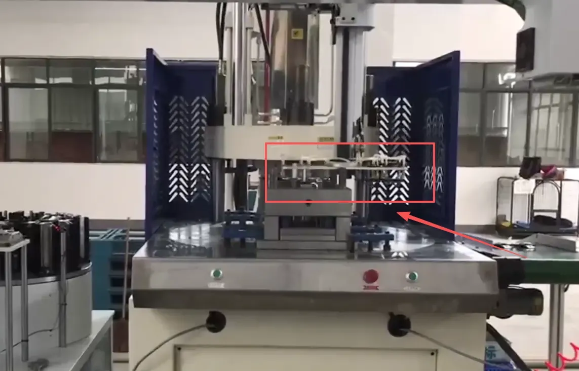 Seat Belt D-ring Insert Molding: Four-Cavity Production with Robot Handling case study illustration